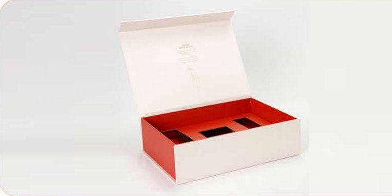 White rigid box prototype with a red insert